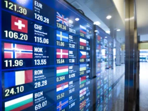 Live foreign currency exchange rates displayed at a currency exchange office